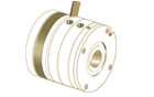 Technical graphic of a pneumatically actuated tooth coupling showing detailed tooth engagement and components.